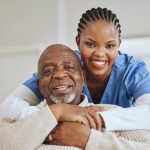 She is my sunshine. Shot of a nurse speaking to her male patient